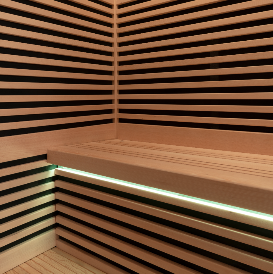 Wooden sauna with horizontal slats and a bench