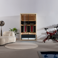 Load image into Gallery viewer, Modern home gym with a stationary bike, dumbbells, and a cabinet.