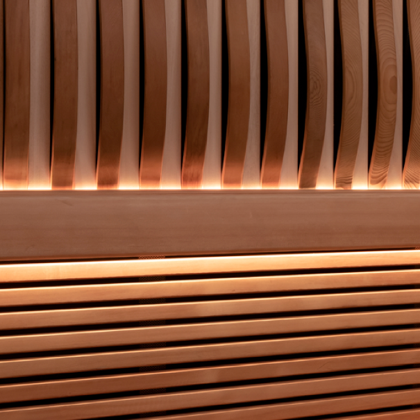 Wooden panel with wavy design and embedded lights