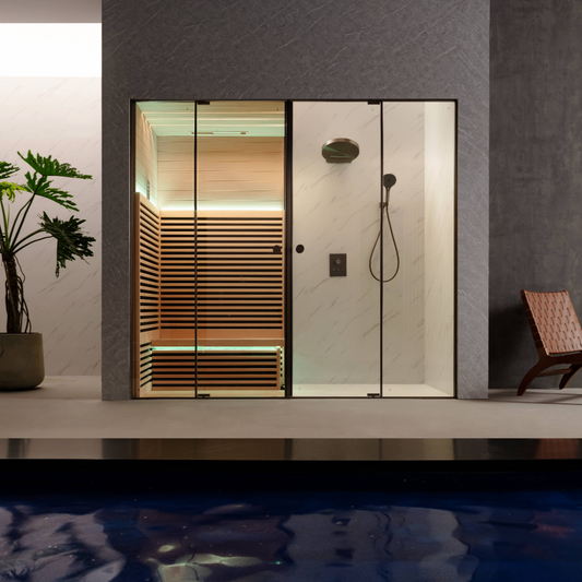 Modern steam room with sauna and shower and wooden bench in a dimly lit room.