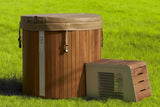 Wooden hot tub and outdoor air conditioning unit on a grassy field