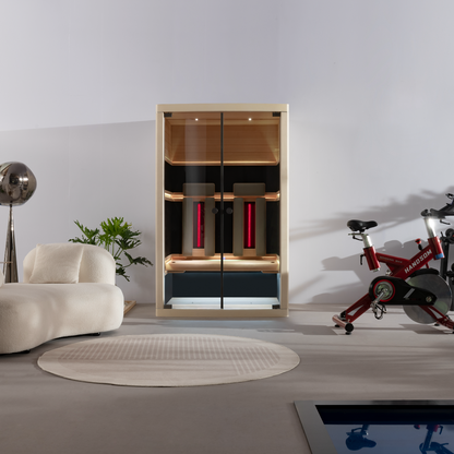 Modern home gym with a stationary bike, dumbbells, and a cabinet.