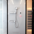 Load image into Gallery viewer, Modern shower setup with handheld shower head and control panel on a white wall.
